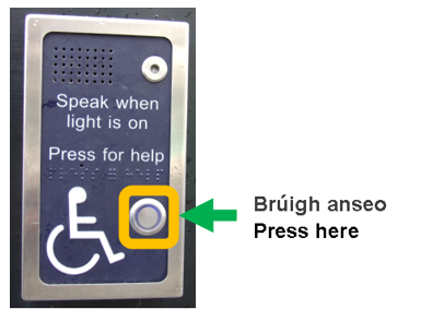 Close-up image of front door buzzer. This picture shows the buzzer at the front door of An Bord Pleanála's office. There is a button located half way down the panel on the right hand side. It is located under the Braille text and has a blue light behind it. In the image, the button to operate the buzzer has a yellow box around it and a green arrow pointing to it from the right-hand side.When the buzzer is pressed, a security guard will unlock the door for you or you can ask for assistance.